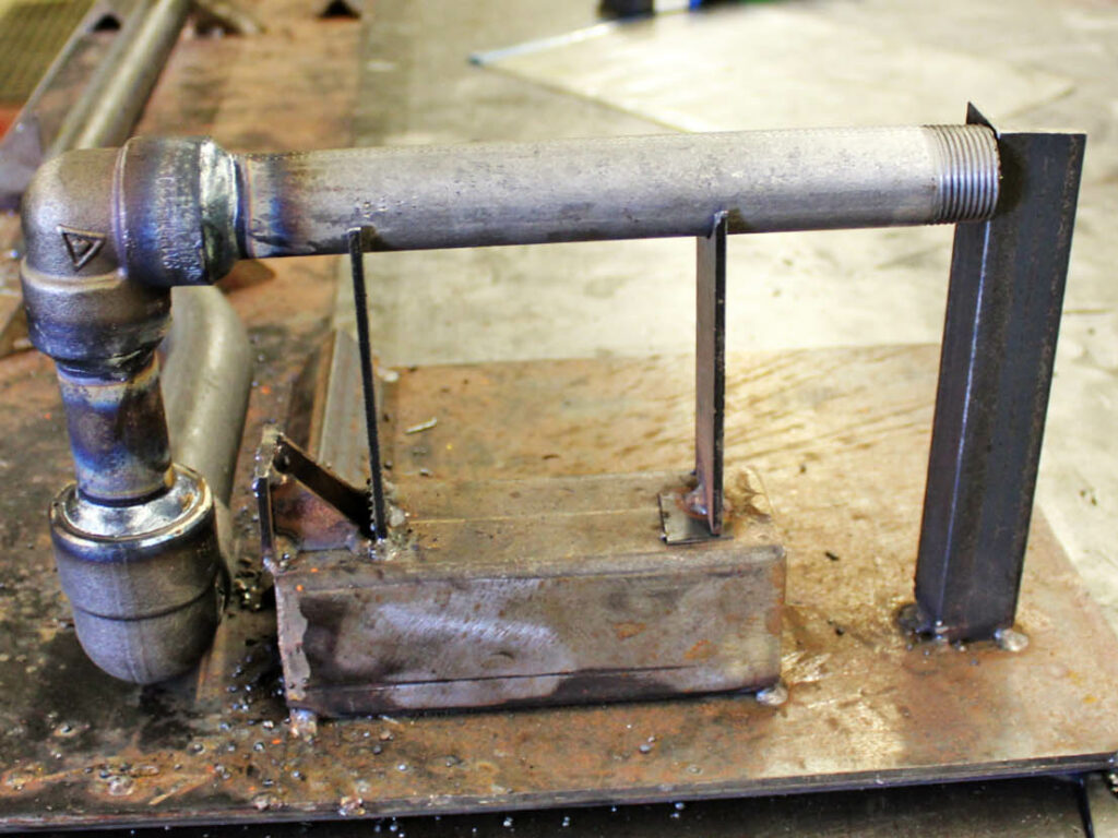 A weld and fit jig used for custom pipe assembly fabrication